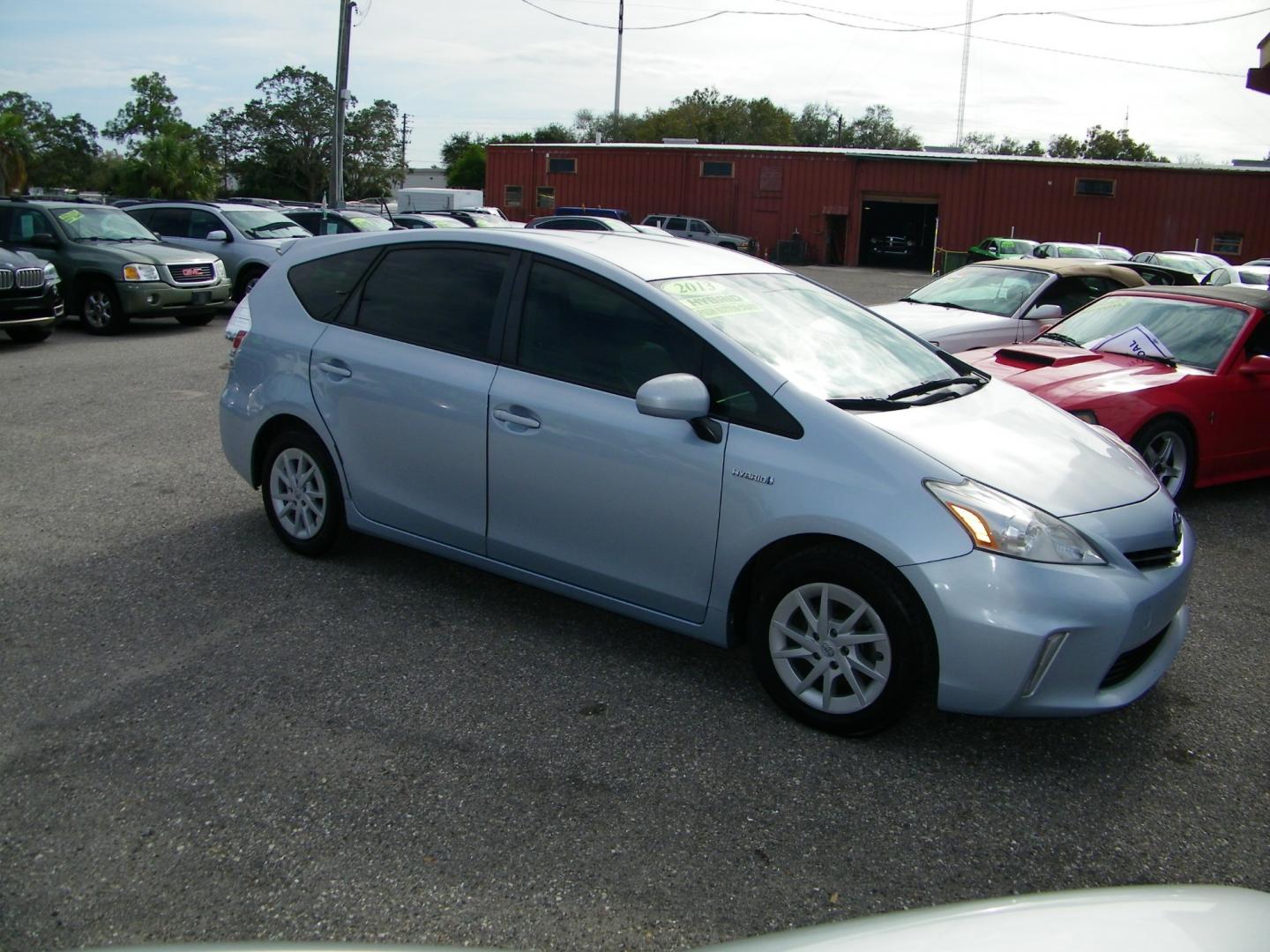 2013 Silver /Beige Toyota Prius V Three (JTDZN3EU5D3) with an 1.8L L4 DOHC 16V HYBRID engine, Continuously Variable Transmission transmission, located at 4000 Bee Ridge Road, Sarasota, FL, 34233, (941) 926-0300, 27.298664, -82.489151 - Photo#10